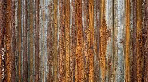 Detailed background of roughened panels in corroded corrugated metal