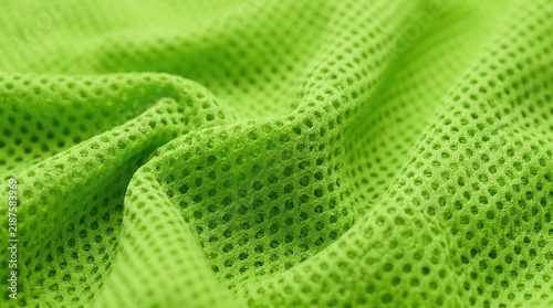Lightweight polyester mesh with a breathable honeycomblike pattern and fabric texture.