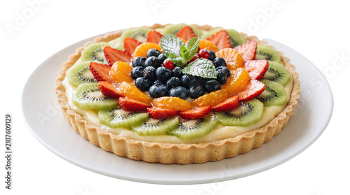 Fresh fruit tart with kiwi, strawberries, blueberries, and mandarin oranges on a white plate isolated on transparent background
