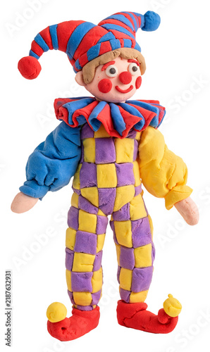 Handmade clay jester figure with colorful checkered costume and pointy hat