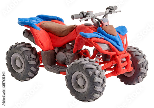 Handmade clay quad bike model with red, blue, and brown colors on white background