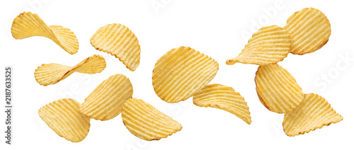 Ruffled potato chips flying isolated on transparent background