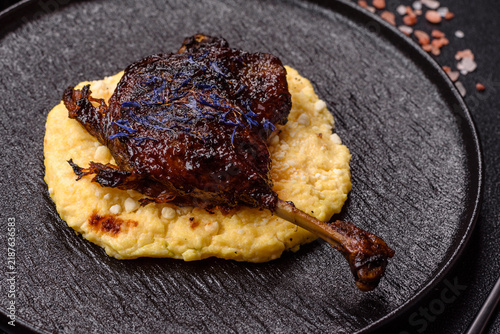Duck leg confit roasted with salt and allspice. Duck leg confit