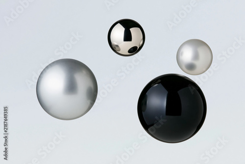 Floating Metallic Spheres in Monochrome Minimal Design
