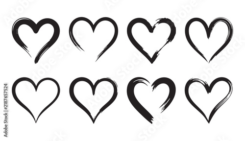 Various black ink brush heart shapes for artistic romantic graphic design projects and web headers.