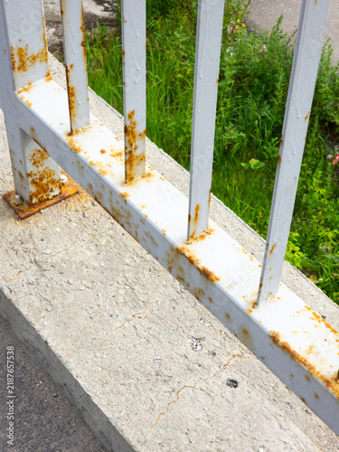 Bild auf Leinwand Close view of rusted metal railing and weathered surface showing corrosion, mate