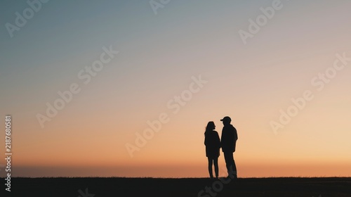 Quiet Connection in Silhouette — two people stand close against a glowing horizon, using simple forms and subtle body language to express trust, emotion, and silent connection.