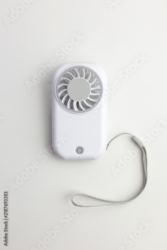 White Portable Mini Handheld Fan with Lanyard on White Background, Top View