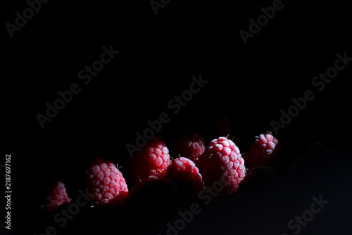 Frozen raspberries with copy space for food blog