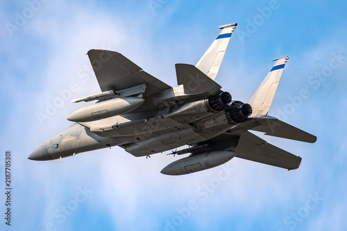 Rear view US air force fighter jet aircraft in flight