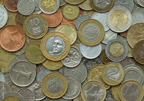 Fotografie Big bunch of coins from various money currencies