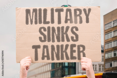 Fotografie "Military Sinks Tanker" Naval forces deliberately destroy Iranian oil vessel in disputed waters