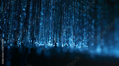 Obraz w ramie Abstract glowing binary code streaming as a technology background with cascading digits