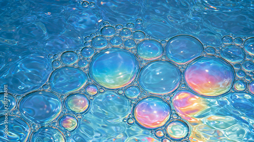 Фотография Abstract Iridescent Bubbles Floating on a Blue Water Surface with Soft Light Ref