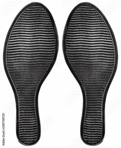 Isolated photo of black rubber female classic shoe sole on white background.