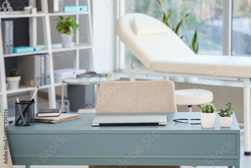 Doctors workplace with laptop in medical office