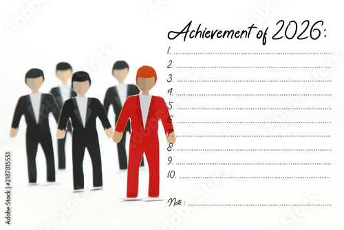 Foto business figures with 2026 achievement schedule and planning board