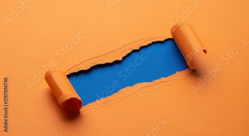 A roll of orange tape peeled back to reveal blue underneath illustration
