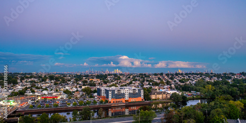 Aerial panorama of Lyndhurst New Jersey at dusk with New York City skyline