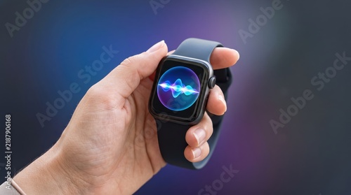 Hand holding smartwatch with voice assistant interface, digital wearable technology concept, modern communication device, futuristic artificial intelligence interaction