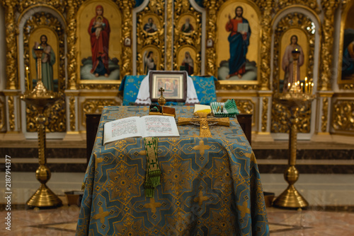 фотографія Golden iconostasis and religious icons in the ornate interior of an Orthodox chu