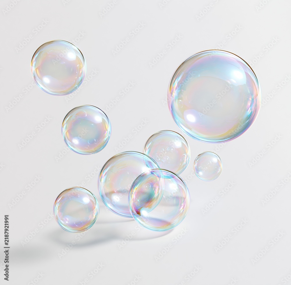 Obraz premium Colorful floating soap bubbles on white background
