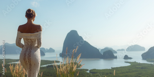 Woman in White Lace Dress at Samet Nangshe Viewpoint in Thailand