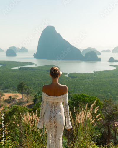 Woman in White Lace Dress at Samet Nangshe Viewpoint in Thailand