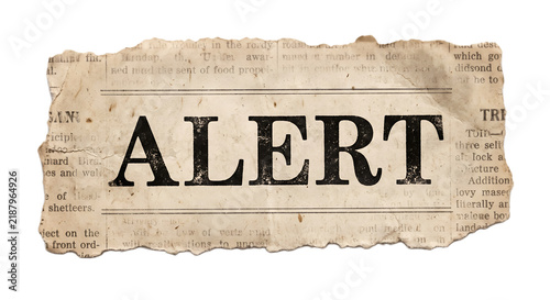 Vintage Torn Newspaper Headline Reading 'ALERT' On Aged Paper With Bold Typographic Warning