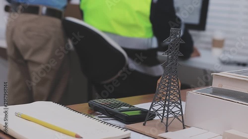 Close-up Of Person's engineer Hand Drawing Plan On Blue Print with architect equipment, Architects discussing at the table, team work and work flow construction concept