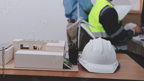 Close-up Of Person's engineer Hand Drawing Plan On Blue Print with architect equipment, Architects discussing at the table, team work and work flow construction concept