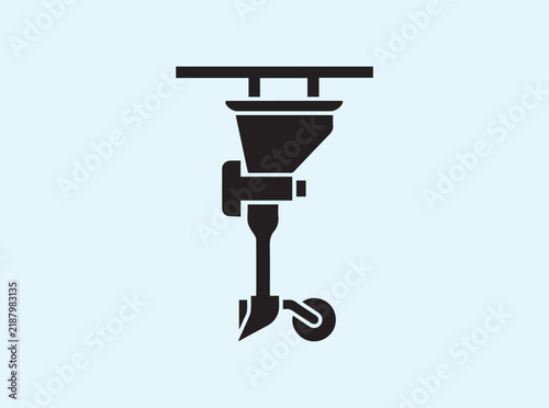 Seed dispenser mechanism with hopper shown in black side silhouette on white