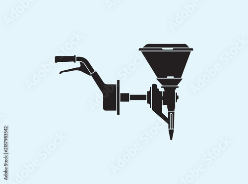 Black silhouette of a crop seeding mechanism with hopper and dispenser from the side on white