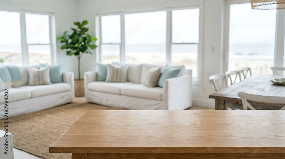 Fototapeta premium Empty wooden table top in bright coastal living room background for product display and modern home interior mockup.