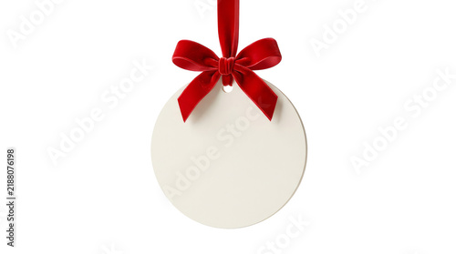 Blank white circular card ornament with a red bow hanging down