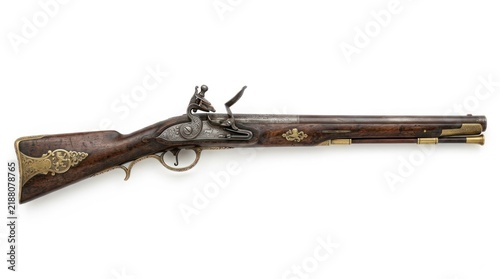 Antique flintlock musket with ornate wooden stock and metal fittings