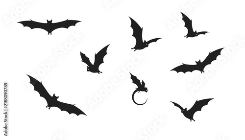 Collection of various bat silhouettes in flight, perfect for Halloween themes or nocturnal wildlife graphic design projects.
