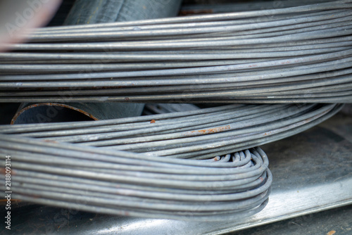 Canvastavla Coils of steel wire and rebar at metal manufacturing industrial warehouse