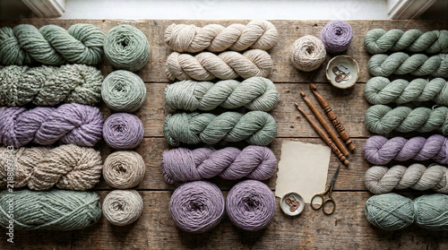 Colorful Yarn Skeins and Knitting Supplies for Handmade Textile Crafts