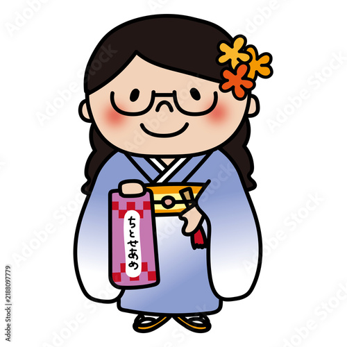 七五三の格好をしている眼鏡を掛けた三つ編みの子供（女の子）