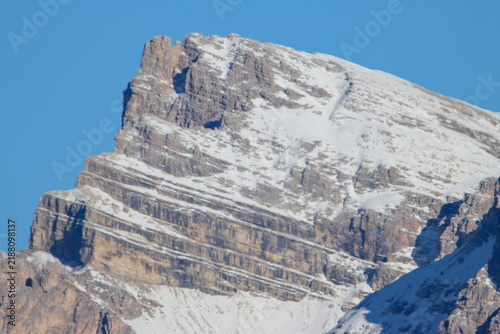 Принти на полотні Snow-covered ridges and rocky cliffs dominate this telephoto landscape of the It