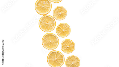 Fotografía Vertical stack row of fresh juicy round yellow lemon slices citrus fruits