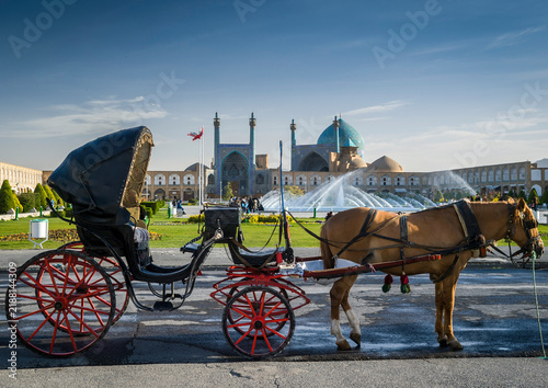 Horse-drawn carriages at the Naghsh-i Jahan Square
 next to the Imam Khomeini Mosque, in Isfahan, Iran