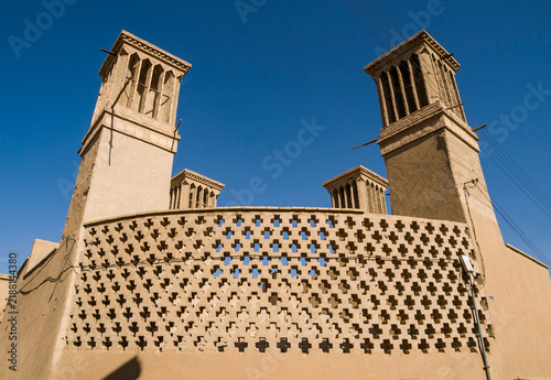 Windcatchers or wind towers are a traditional architectural element used to create cross ventilation and passive cooling in buildings, in Yazd, Yazd Province, Iran