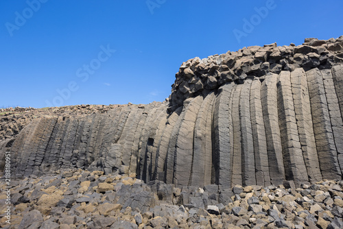 Obraz na plátně Penghu island basalt rock cliff face and shore