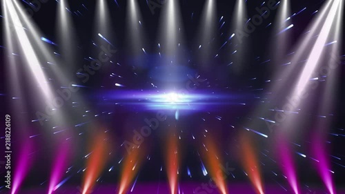 Vibrant stage lights shine down on empty space