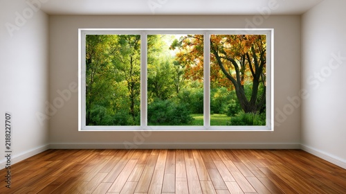 Bright and Airy Interior Space with Large Windows Showcasing Lush Green Trees and Vibrant Autumn Foliage in a Calm and Serene Environment
