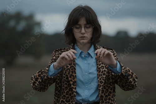 Cute Girl in Leopard Coat and Blue Shirt