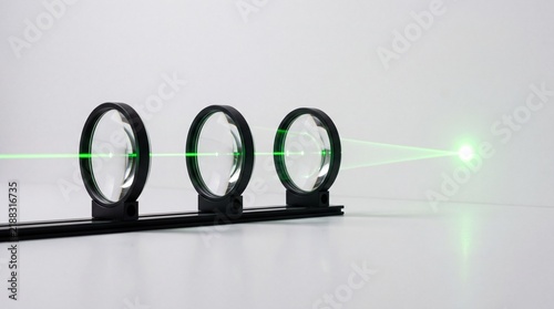 Green Laser Beam Aligning Through Three Precision Optical Ring Mounts