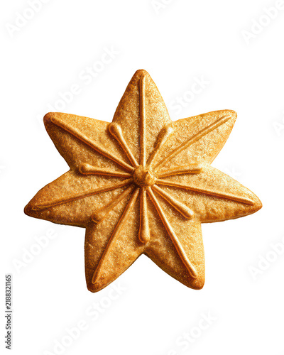 Golden star-shaped decorative cookie with detailed icing design isolated on white background for festive celebration